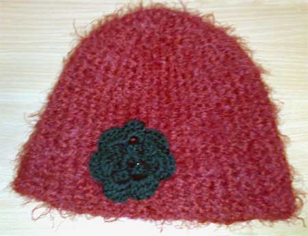 Hat with a flower